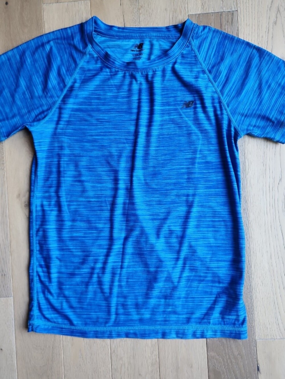 Boys New balance T-shirt. Size large.